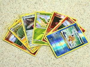 lot 105 image: Seven Stage 1 Pokemon Reverse Hologram Cards - Including Charjabug Fusion Strike