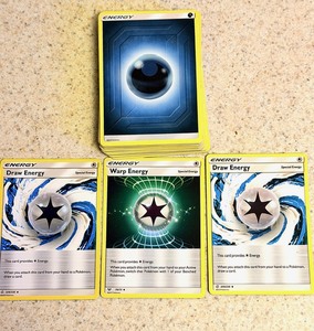 lot 110 image: 40 Assorted Energy Cards - Including Uncommon Draw Energy Cosmic Eclipses &amp Uncommon Shining Legends Warp Energy