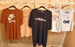 lot 83 image: Lot of 5 Graphic Tees - Including&nbspChampion as worn by Cliff Booth&nbspinOnce Upon a Time in Hollywood&nbspVintage&nbspNike Just Do It&nbsp&nbsp8-Ball Crop