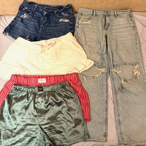 lot 86 image: American Eagle Shorts &amp Distressed Pair of Shorts &amp Jeans (Sizes in Photos)
