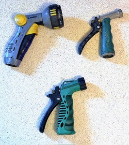 lot 93 image: Three LawnGarden Hose Nozzle Sprayers