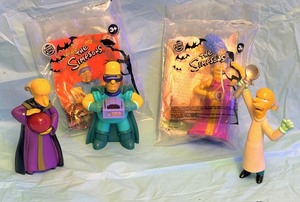 lot 115 image: Burger King 2011 The Simpsons Treehouse of Horror ToyFigures