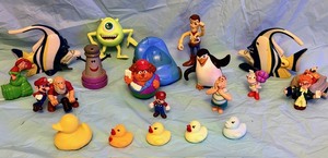 lot 120 image: Twenty-One Vintage Collectible Figures, Toys, &amp Kids Meal Toys - Including Woody &amp Super Mario Brothers