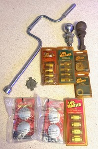 lot 145 image: Automotive Repair Tools &amp Parts - Including Tow Hitch Balls and New Lug Nuts &amp Mirrors