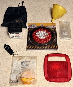 lot 150 image: Assorted Automotive Tools &amp Parts - Including Porta-Jumper Emergency Car Jumpstarter, Lens Covers, &amp Digital Tire Gauge
