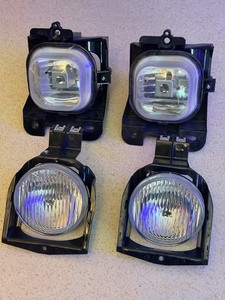 lot 158 image: Two (2) Clear Lens Fog Light For 2004-05 Ford Ranger LHPlastic Lens w Bulb &amp Two (2) for 1994-98 Dodge Ram 1500, 2500, &amp 3500