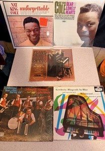 lot 187 image: Nat King Coles Unforgettable &amp Dear Lonely Hearts Albums WThree Other Vintage Albums