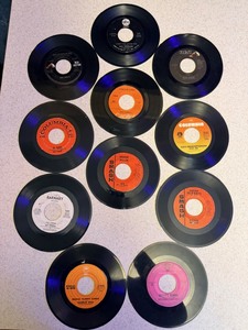 lot 198 image: Eleven (11) Assorted Vintage 45s - including Ray Charles, Glen Campbell,Eddy Arnold, Marty Robbins, Ray Stevens, Charlie Rich, &amp Rodger Miller
