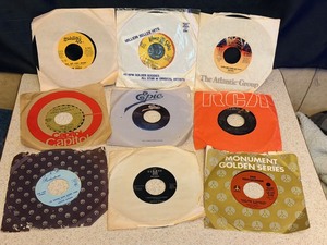 lot 199 image: Nine (9) Assorted Vintage 45s in Dust Jacket - including Jim Croce, The Loving Spoonful, Dan Hill, The Clash &amp Taco