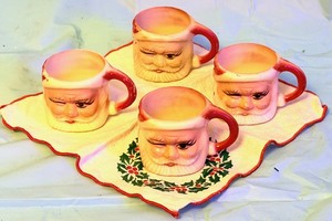 lot 233 image: Vintage Winking Santa Claus Mini Plastic Mugs MCM 1-12 Honk Kong Lot of 4