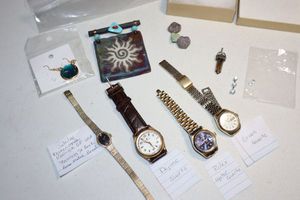 lot 66 image: Jewelry watches, stone sun pin, moon earrings and Misc., see photos for description of markings