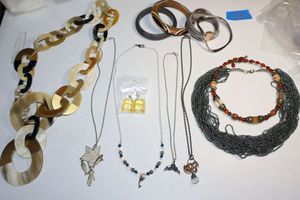 lot 68 image: Jewelry Dolphin fin necklaces, beaded necklaces and bangle bracelets