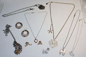 lot 69 image: Animal themed jewelry, Cherub pins, heart necklace, beaded feather pendant necklace