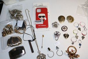 lot 70 image: Metal link belts, belt buckles, Paul Lagerfeld iPhone case, wine bottle rings and more