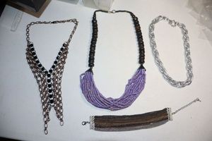 lot 73 image: Metal chain link jewelry and purple wood beaded necklace