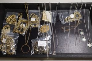 lot 85 image: Gold tone and silver tone chain necklaces, various lengths
