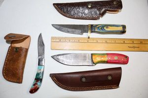lot 117 image: Damascus steel knives Hunting knives and folding pocket knife
