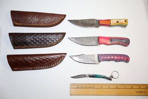 lot 125 image: Damascus steel knives Hunting knives and folding pocket key ring knife