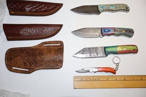 lot 126 image: Damascus steel knives hunting knives and folding pocket key ring knife