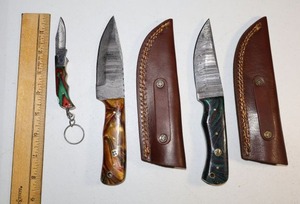 lot 109 image: Damascus steel knives Hunting knives and folding key chain knife