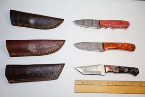 lot 137 image: Damascus steel knives Hunting knives