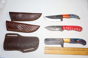 lot 142 image: Damascus steel knives Hunting knives