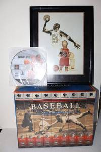lot 47 image: Sports theme lot Baseball history VHS series (unopened), NBA Live 07 Playstation 2 game, and Michael Jordan print
