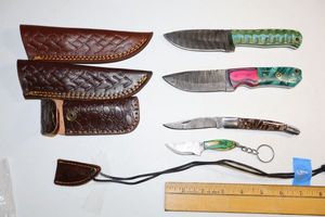 lot 39 image: Damascus steel knives - Hunting knives, folding pocketknife, and keychain knife