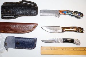 lot 19 image: Damascus steel knives - Hunting knives, and folding pocketknife