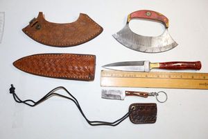 lot 21 image: Damascus steel knives - Ulu knife, dagger, and keychain knife