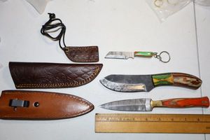 lot 23 image: Damascus steel knives - Hunting knife, dagger, and keychain knife