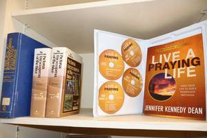 lot 169 image: Biblical encyclopedias, Strongs Bible Concordance, and Living A  Praying Life curriculum
