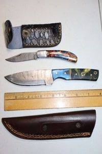 lot 182 image: New - Damascus steel hunting and folding pocket knives