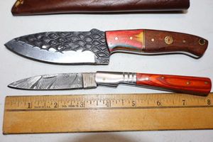 lot 188 image: New - Damascus steel hunting and folding pocket knives