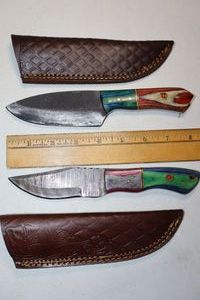 lot 194 image: New -Damascus steel hunting knives