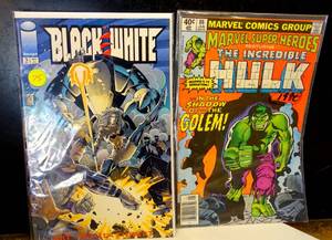 lot 75 image: LOT OF 2 COMIC BOOKS AS SHOWN