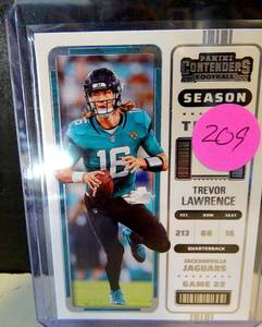 lot 209 image: 2022 Panini Contenders Trevor Lawrence Season Ticket - Jags