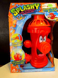 lot 294 image: NEW - Splash Fire Hydrant Sprinkler Attach To Any Garden Hose Spin Sprays Water Red