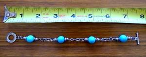 lot 196 image: $$$ P.B. 925 STERLING JADE STONE AND SILVER BRACELET