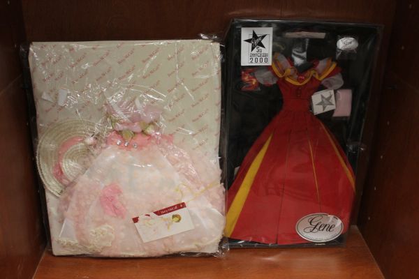 lot 81 image: Ashton-Drake Ensemble Hearts Afire fashion doll ensemble from the year 2000 and Vintage Lady Lovely Locks doll dress from the 1980s collectable outfit from Mattel