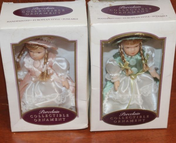 lot 82 image: Two 5 inch Porcelain Poseable Doll Ornaments by DG Creations