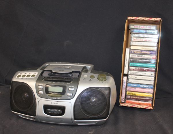 lot 214 image: Mini Boombox and Various Cassettes