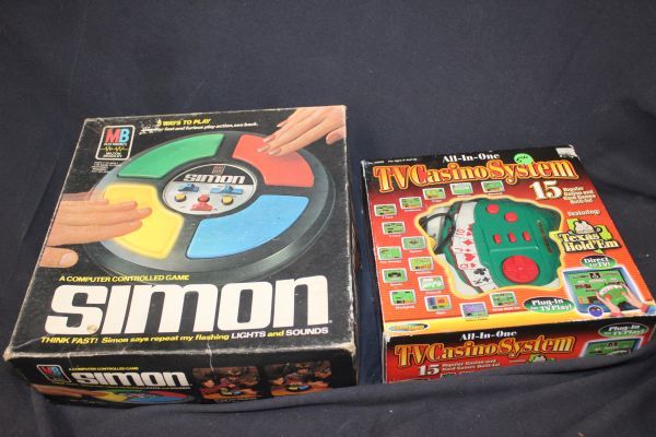 lot 21 image: Vintage 1978 Milton Bradley Simon Electronic Memory Game in Original Box and Techno Source All-in-One TV Casino System a plug-and-play television game console