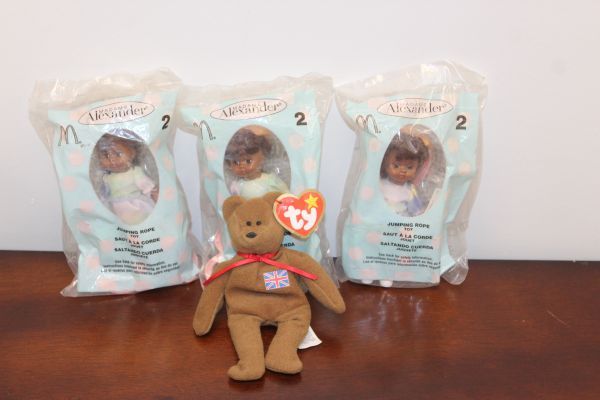 lot 76 image: Vintage Britannia Bear and Three Madame Alexander Dolls in Original Packaging