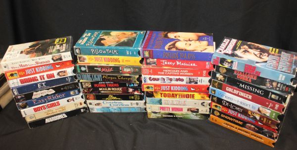 lot 268 image: VHS Movies See Photos for More Information