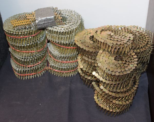 lot 257 image: Generous Quantity of collated wire coil nails