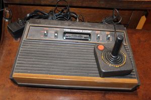 Vintage Atari 2600 game console and one controller