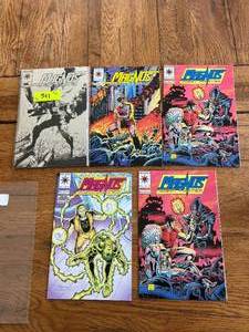 lot 11 image: Selection of vintage comics - Valiant - Magnus Robot Hunter