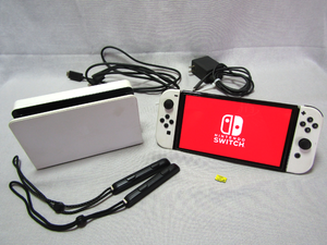 lot 1 image: Nintendo Switch OLED plus accessories