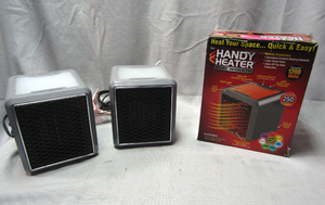 lot 29 image: Handy heaters with illuminated tops